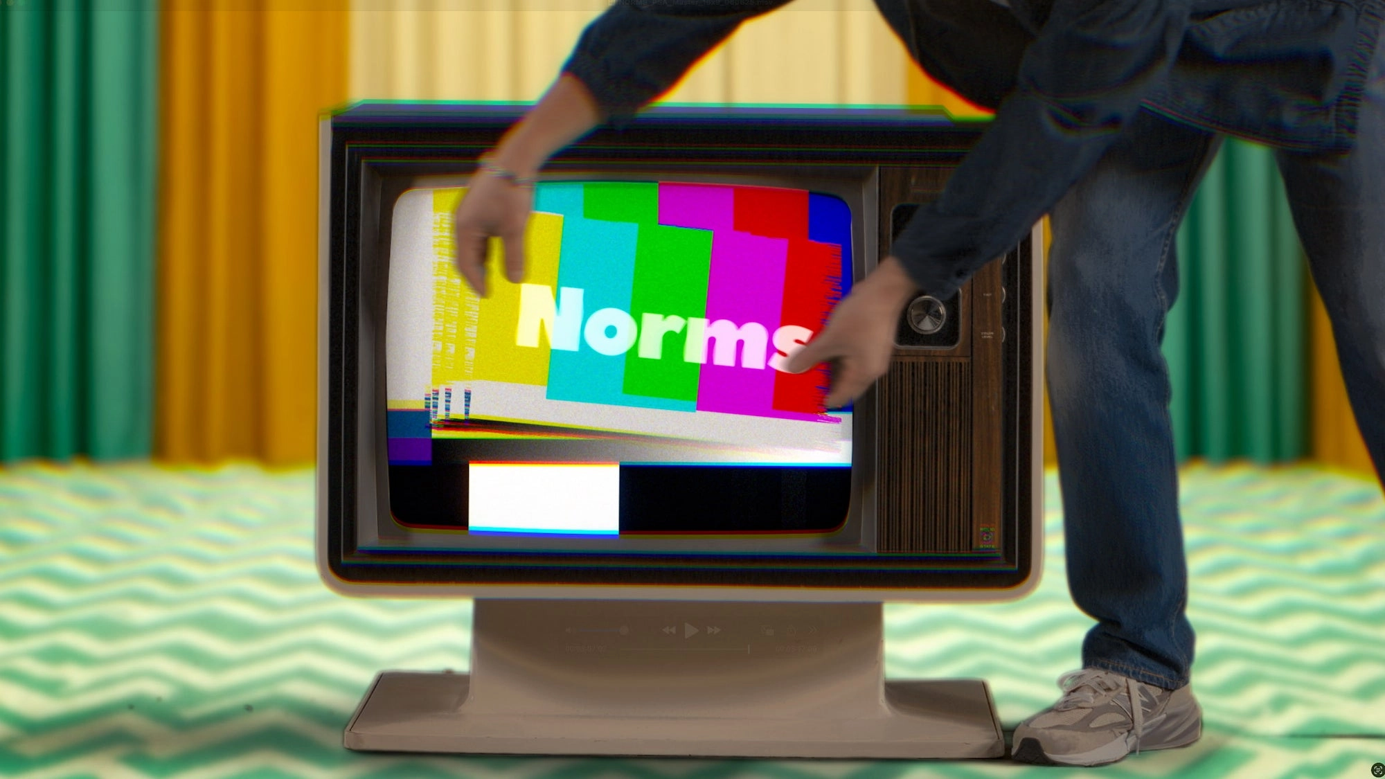 Old television set showing color bars and the Norms logo